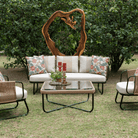 Outdoor center table madeup of metal framework that has nylon weaving and glass top